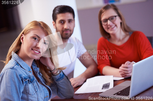 Image of students group working on school  project  together