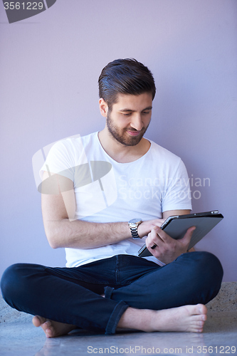 Image of student working on tablet