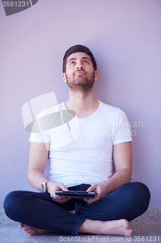 Image of student working on tablet