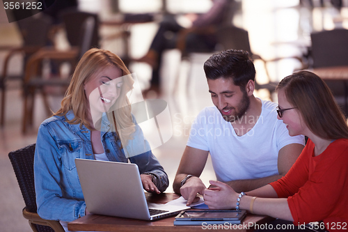 Image of students group working on school  project  together