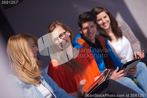 Image of students group working on school  project  together