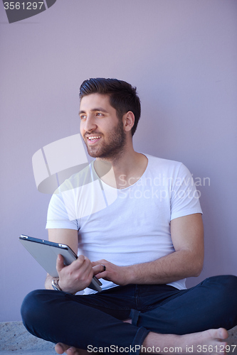 Image of student working on tablet