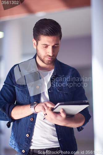 Image of student using tablet computer