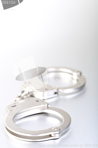 Image of handcuffs high-key