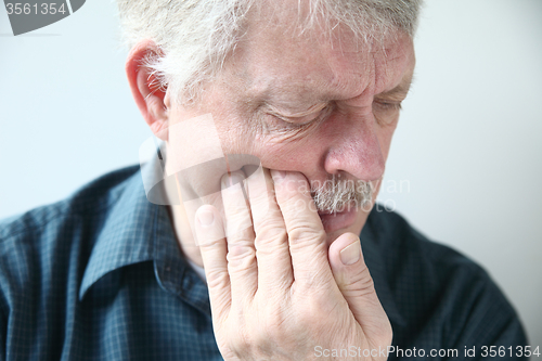 Image of Man suffers from face pain