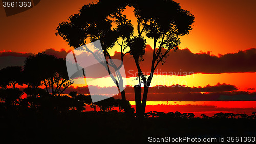 Image of Sunset over beautiful lake region
