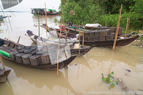 Image of Fishing boats on Ywe River in Myanmar