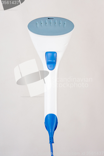 Image of Hand household steamer on a light background