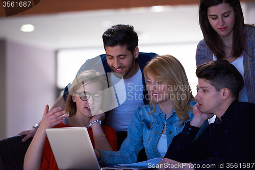 Image of students group working on school  project  together