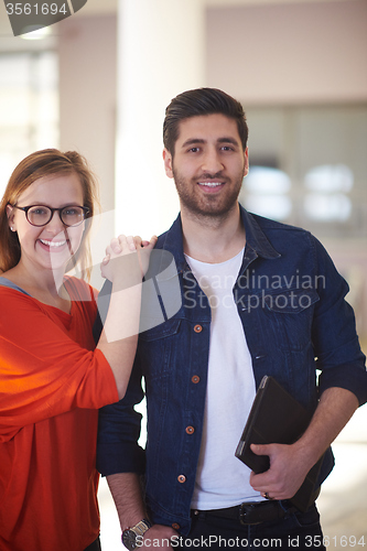 Image of students couple standing together
