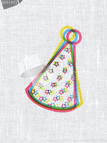 Image of Entertainment, concept: Party Hat on fabric texture background