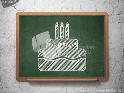 Image of Entertainment, concept: Cake on chalkboard background