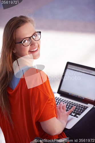 Image of student girl with laptop computer