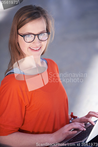 Image of student girl with laptop computer