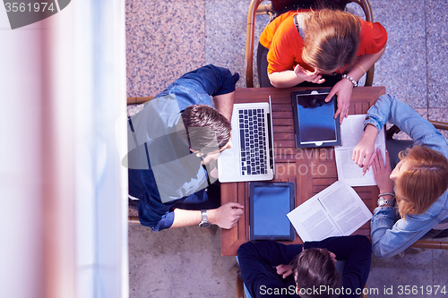 Image of students group working on school  project  together