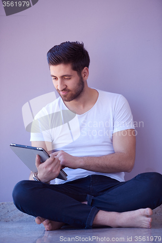 Image of student working on tablet