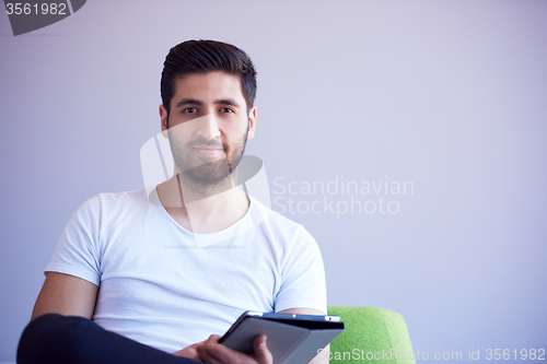 Image of student working on tablet