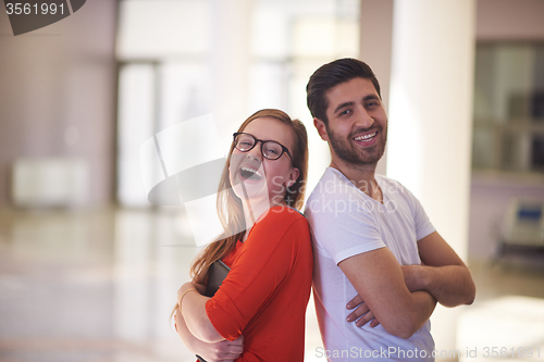 Image of students couple standing together