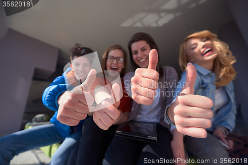 Image of students group working on school  project  together