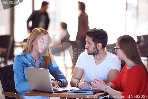 Image of students group working on school  project  together