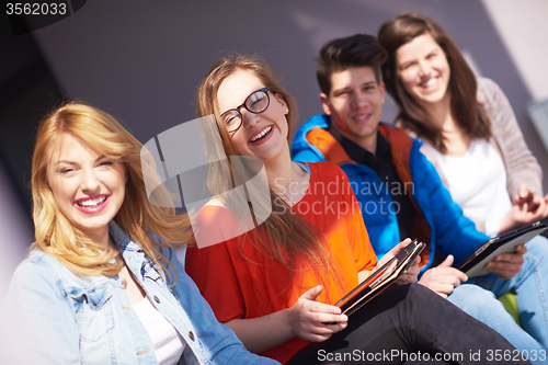 Image of students group working on school  project  together
