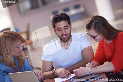 Image of students group working on school  project  together
