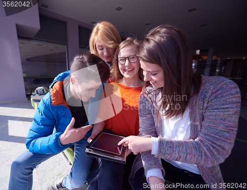 Image of students group working on school  project  together