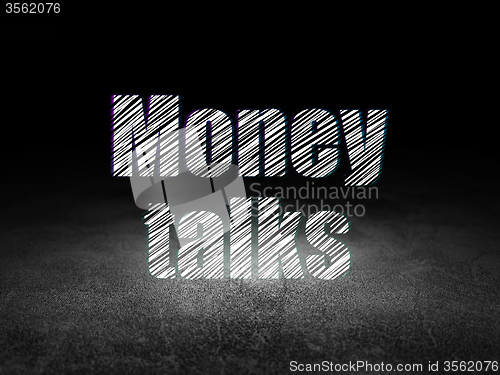 Image of Business concept: Money Talks in grunge dark room