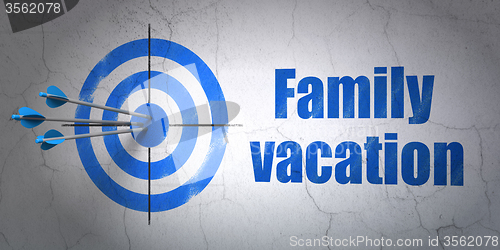 Image of Vacation concept: target and Family Vacation on wall background