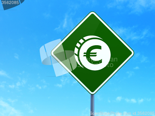 Image of Banking concept: Euro Coin on road sign background