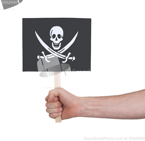 Image of Hand holding small card - Flag of Pirate