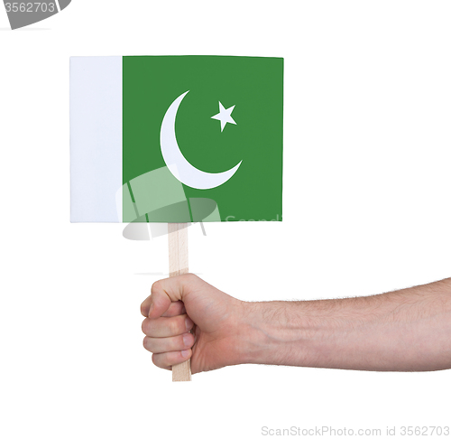 Image of Hand holding small card - Flag of Pakistan