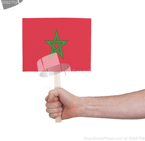Image of Hand holding small card - Flag of Morocco