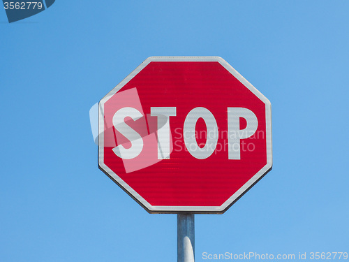 Image of Stop sign over blue sky