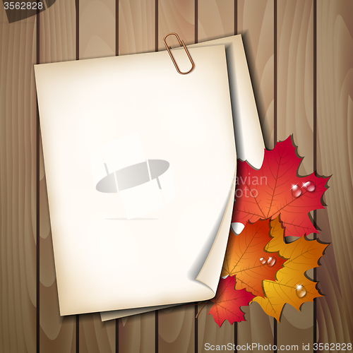 Image of Paper sheet with autumn leaves