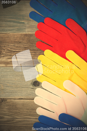 Image of set of colored construction gloves