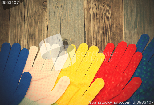 Image of multicolored construction gloves