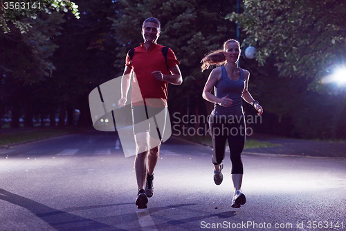 Image of couple jogging at early morning