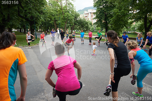 Image of jogging people group stretching