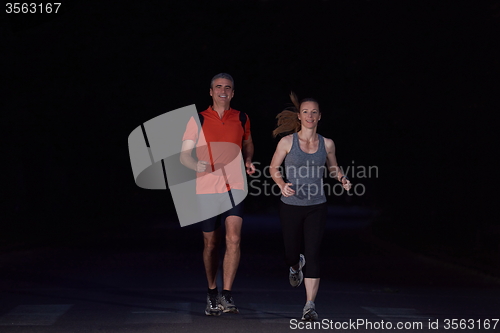 Image of couple jogging at early morning