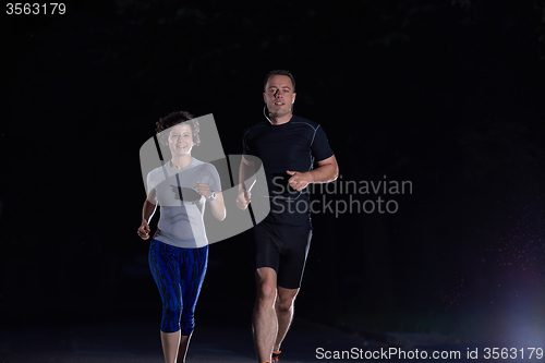 Image of couple jogging at early morning