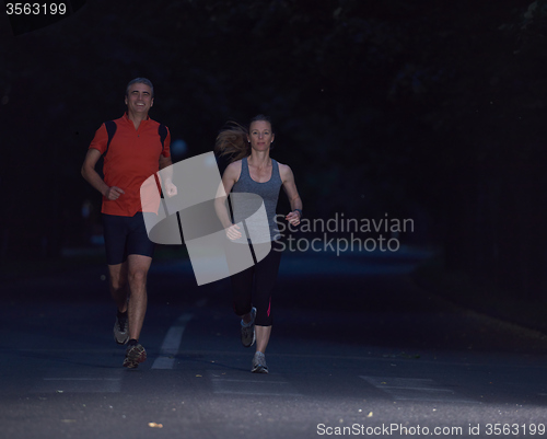 Image of couple jogging at early morning