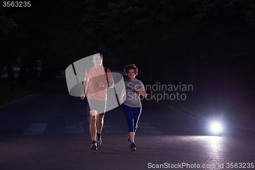 Image of couple jogging at early morning