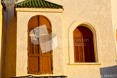 Image of   yellow window in  wall  