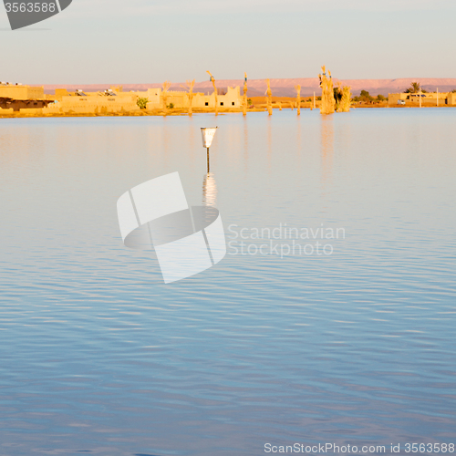 Image of sunshine in the lake yellow  desert of morocco sand and     dune