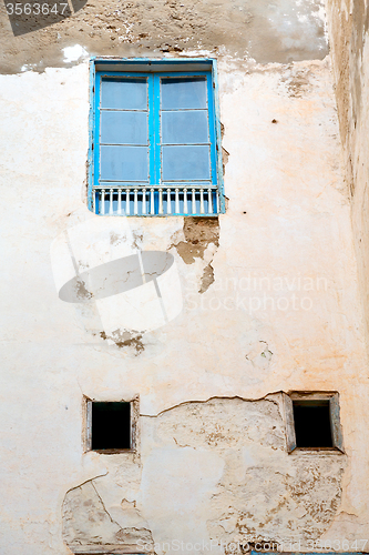 Image of blue window in   africa old construction  
