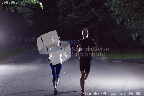 Image of couple jogging at early morning