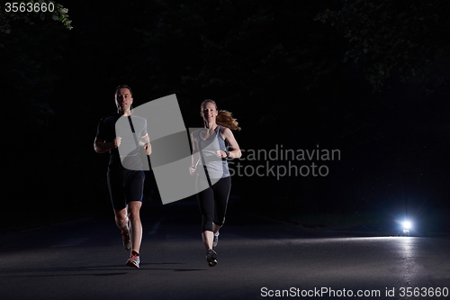 Image of couple jogging at early morning