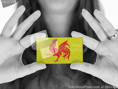 Image of Woman showing a blank business card