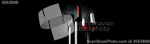Image of Two bottles and wineglass